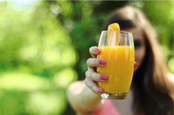 Woman with a glass of juice